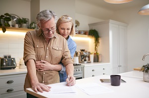 couple filling out paperwork